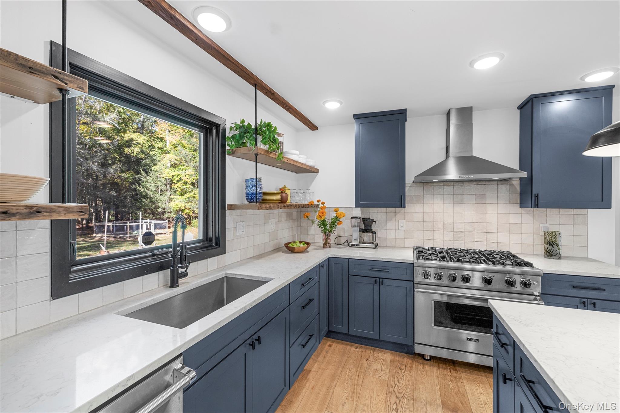 90 Van Dale Road Woodstock, NY 12498 - Photo 20 of 49 a kitchen with a sink stove top oven and cabinets
