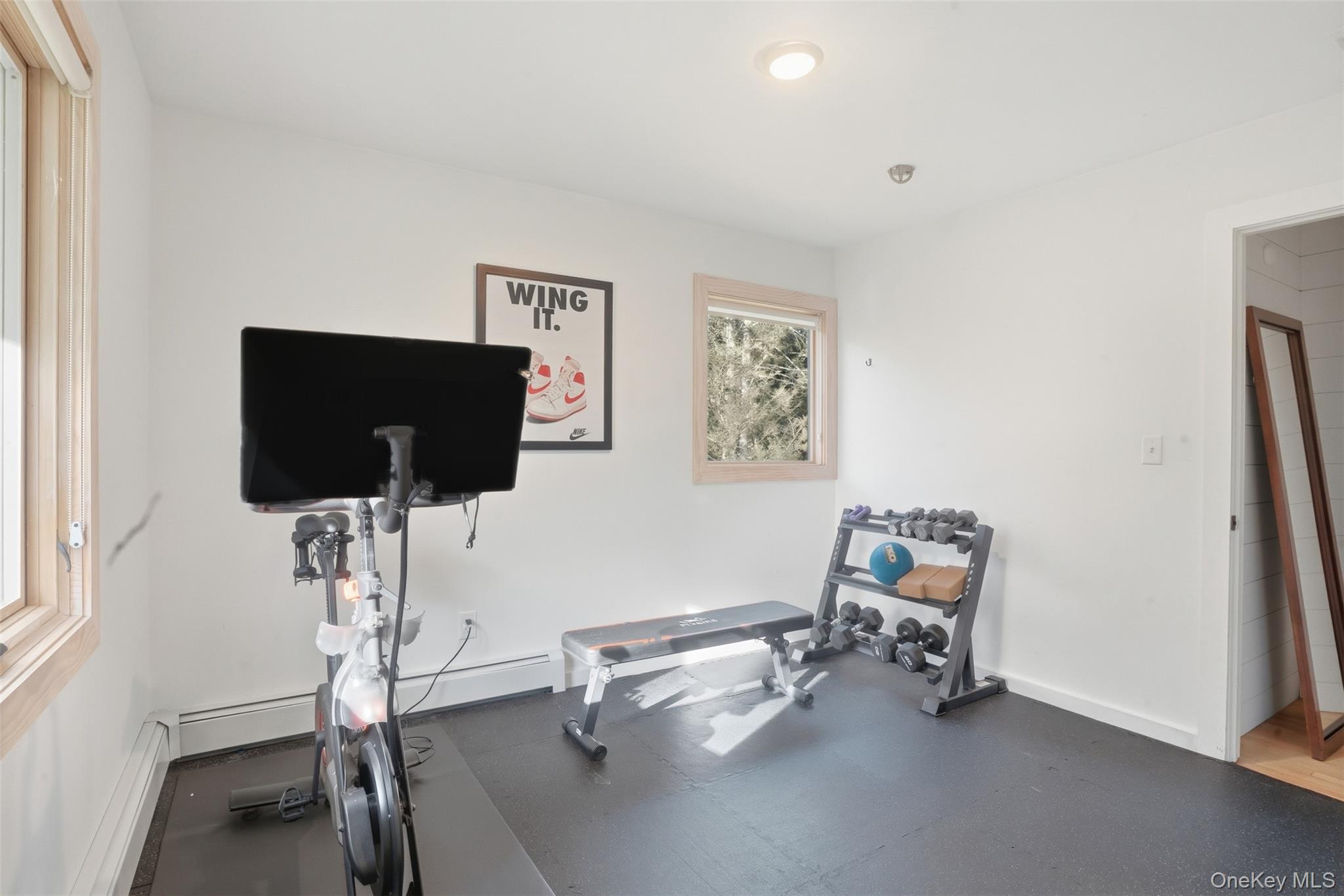 90 Van Dale Road Woodstock, NY 12498 - Photo 29 of 49 a living room with furniture and a flat screen tv