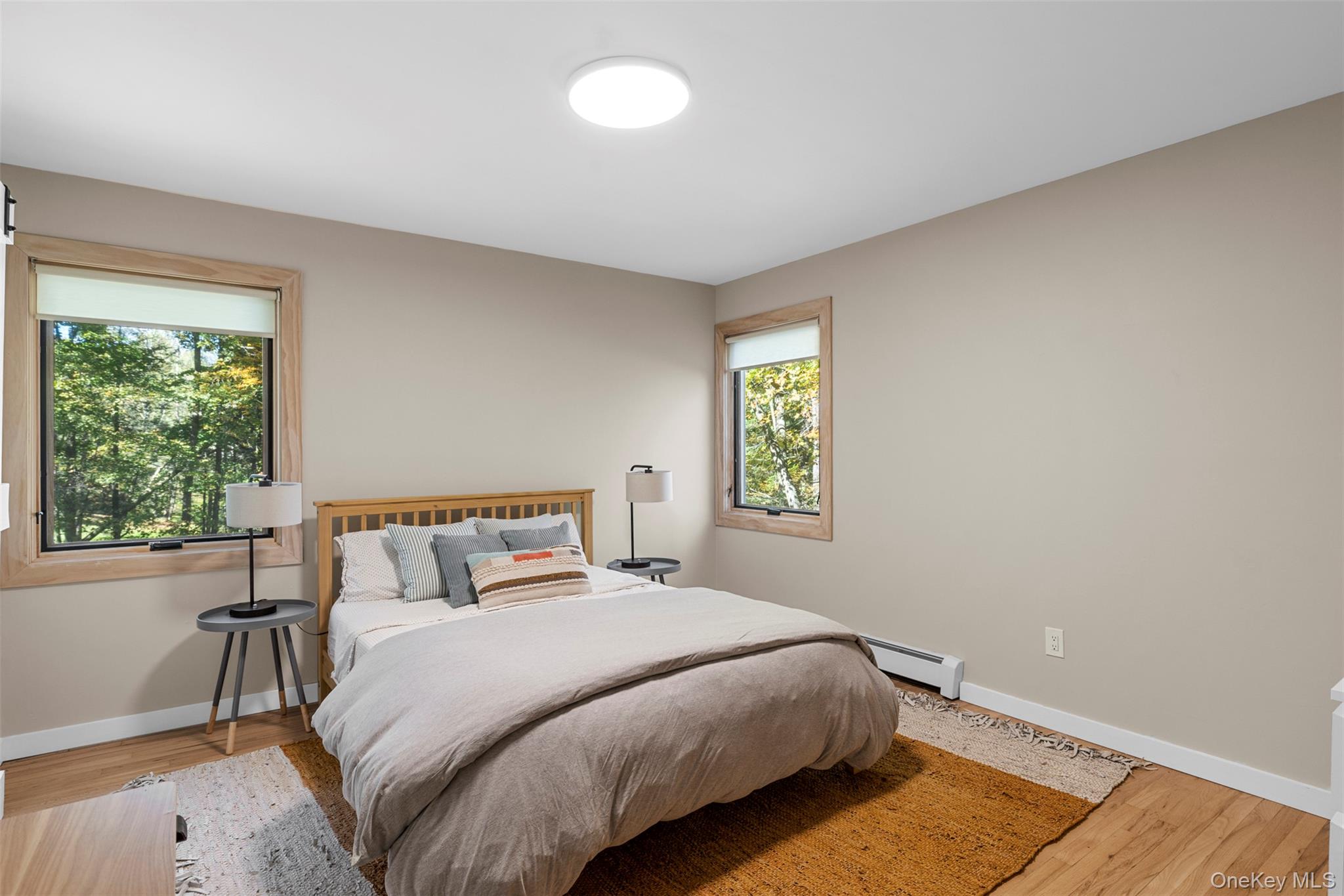 90 Van Dale Road Woodstock, NY 12498 - Photo 31 of 49 a bedroom with a bed and window