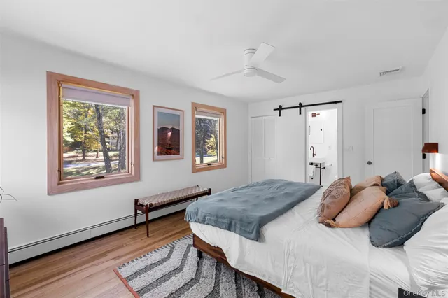 a view of a livingroom with a patio and a yard