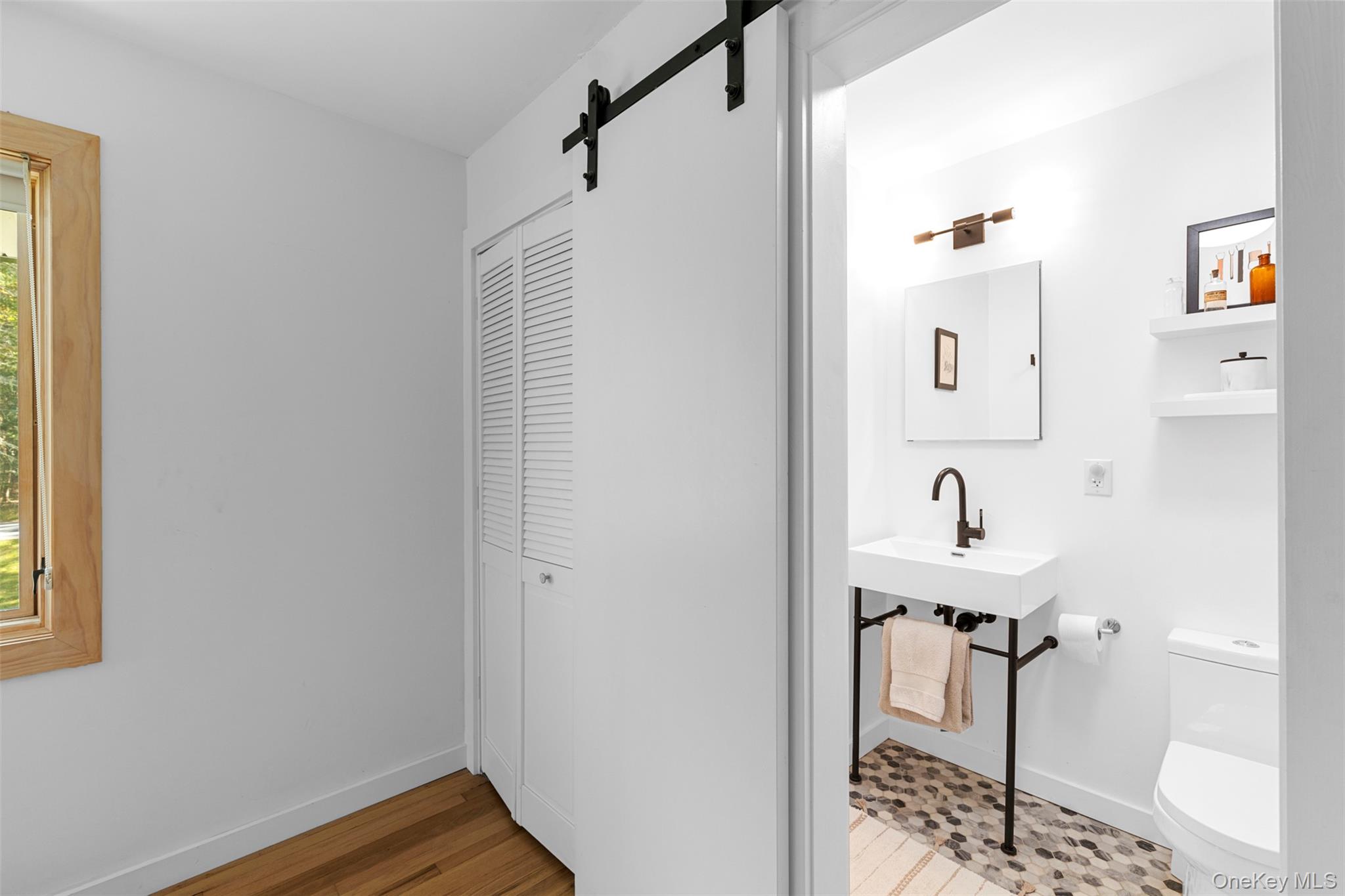 90 Van Dale Road Woodstock, NY 12498 - Photo 39 of 49 a bathroom with a sink and a mirror