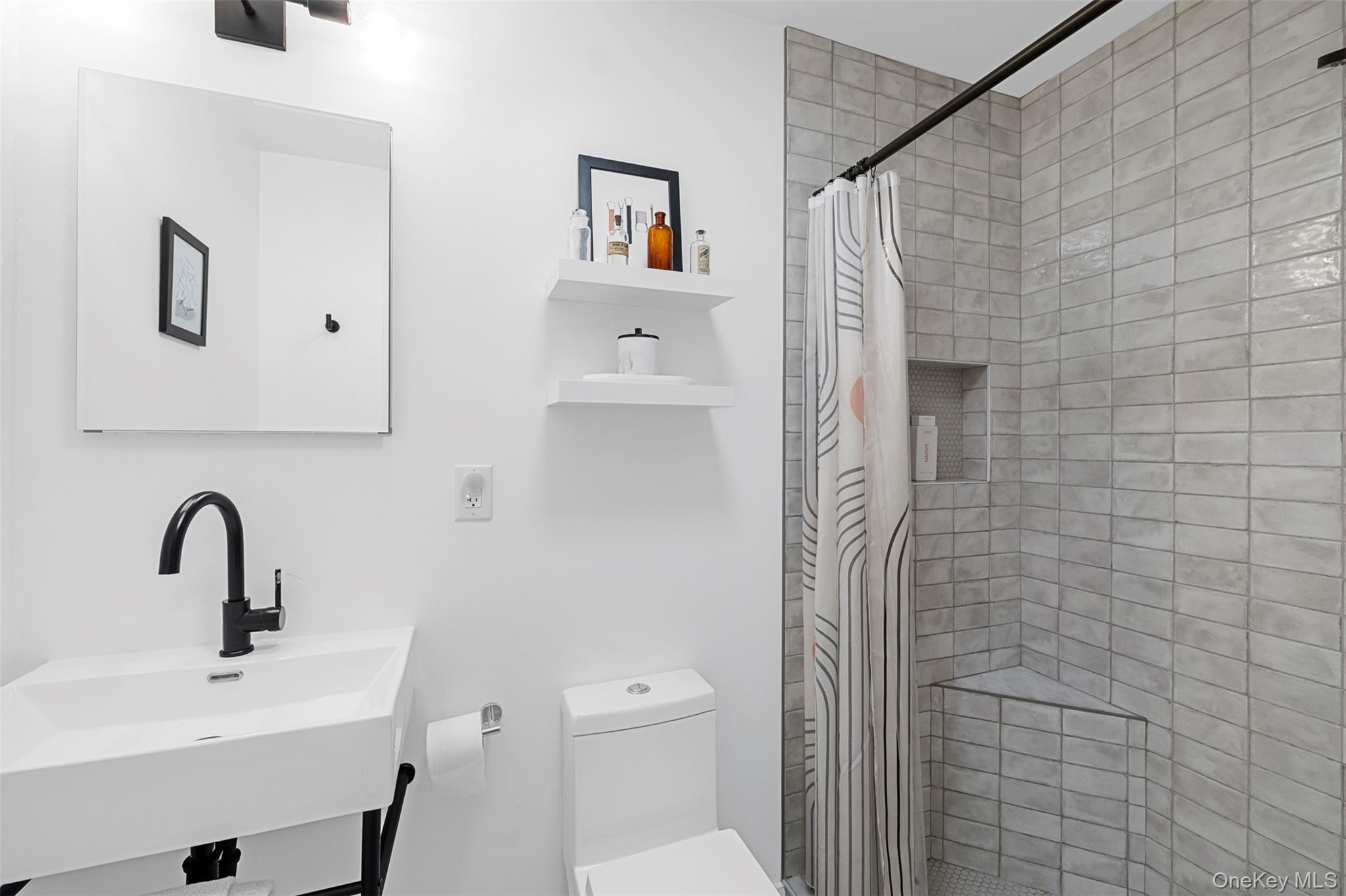 90 Van Dale Road Woodstock, NY 12498 - Photo 40 of 49 a bathroom with a sink a toilet and shower