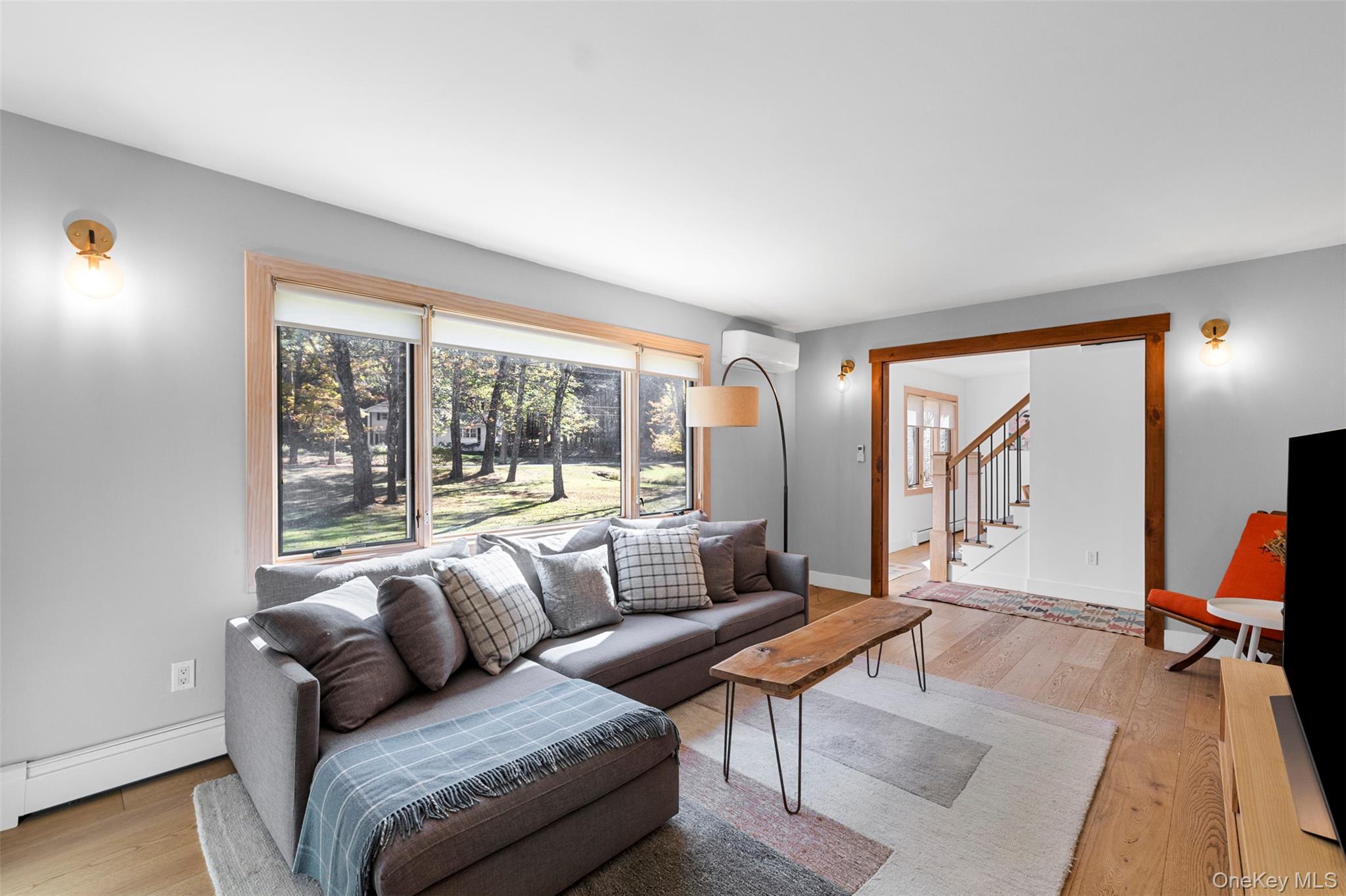 90 Van Dale Road Woodstock, NY 12498 - Photo 10 of 49 a living room with furniture and a large window