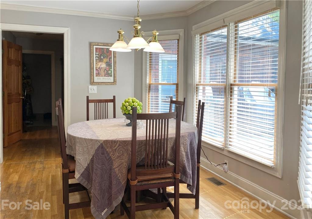 2280 Gheen Road Salisbury, NC 28147 - Photo 19 of 39 a view of a dining room with furniture and chandelier