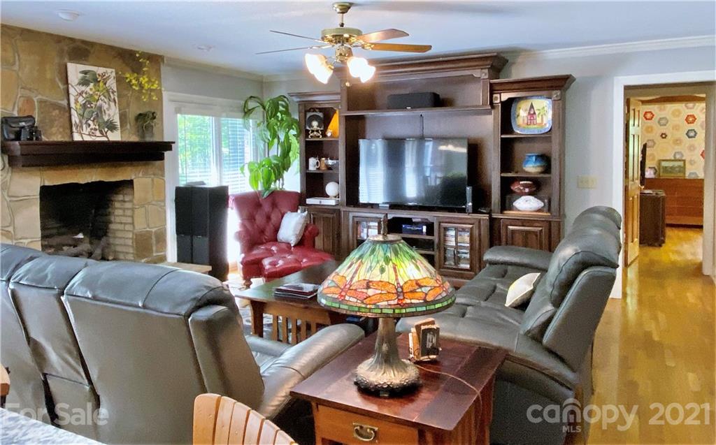 2280 Gheen Road Salisbury, NC 28147 - Photo 26 of 39 a living room with fireplace furniture and a flat screen tv