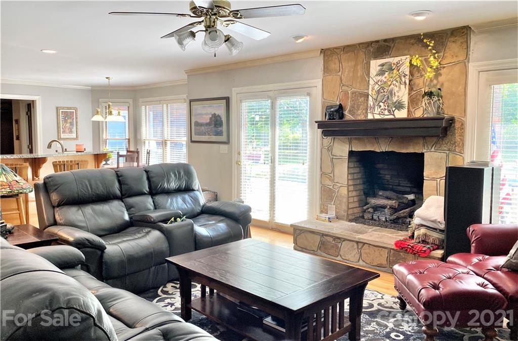2280 Gheen Road Salisbury, NC 28147 - Photo 27 of 39 a living room with furniture and a fireplace