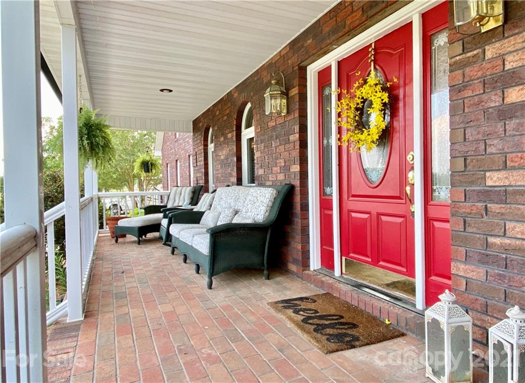 2280 Gheen Road Salisbury, NC 28147 - Photo 8 of 39 a building outdoor space with patio furniture and potted plants