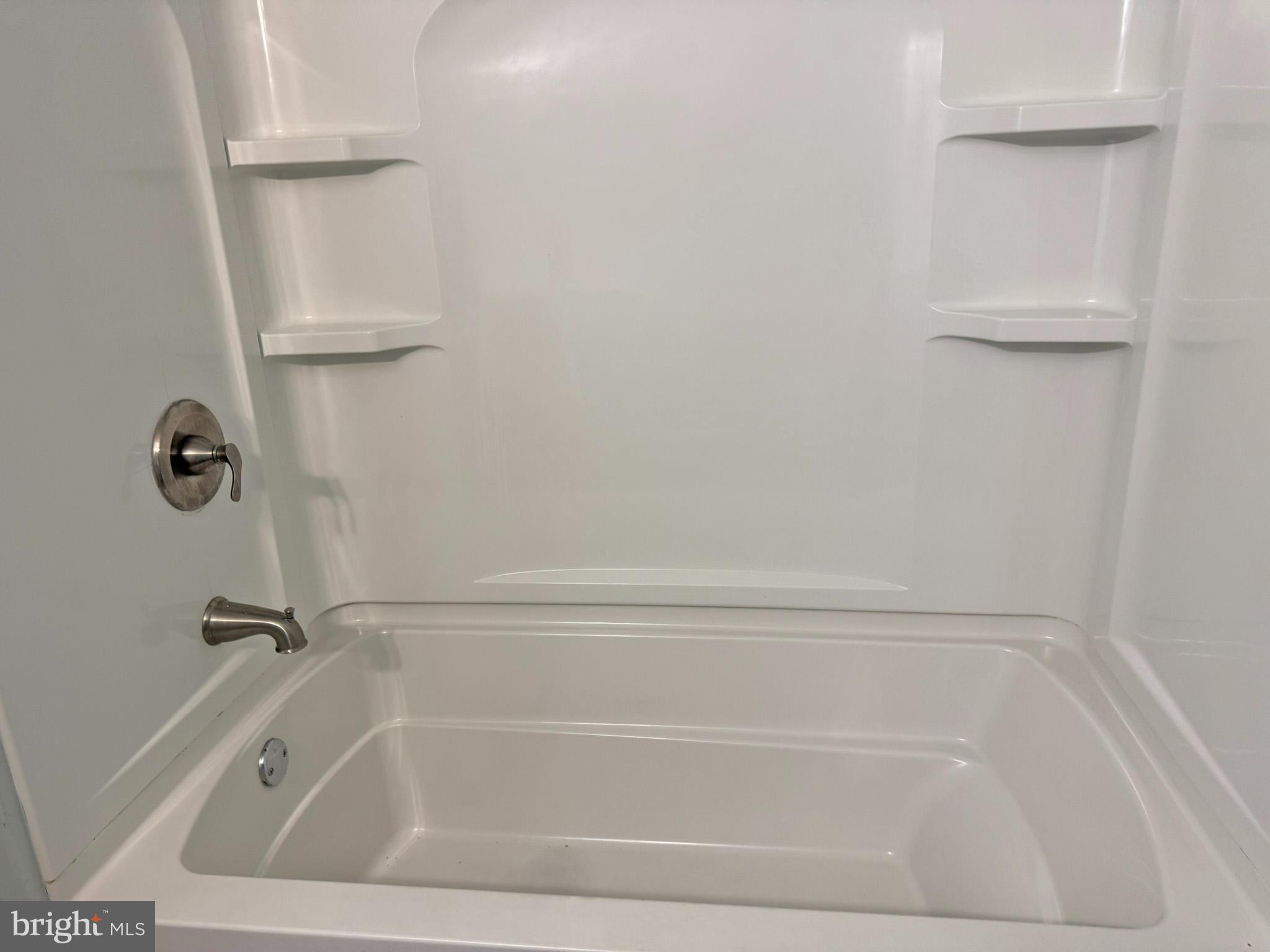 1316 Edgemont Road Harrisburg, PA 17109 - Photo 7 of 21 a close view of a bathtub in bathroom