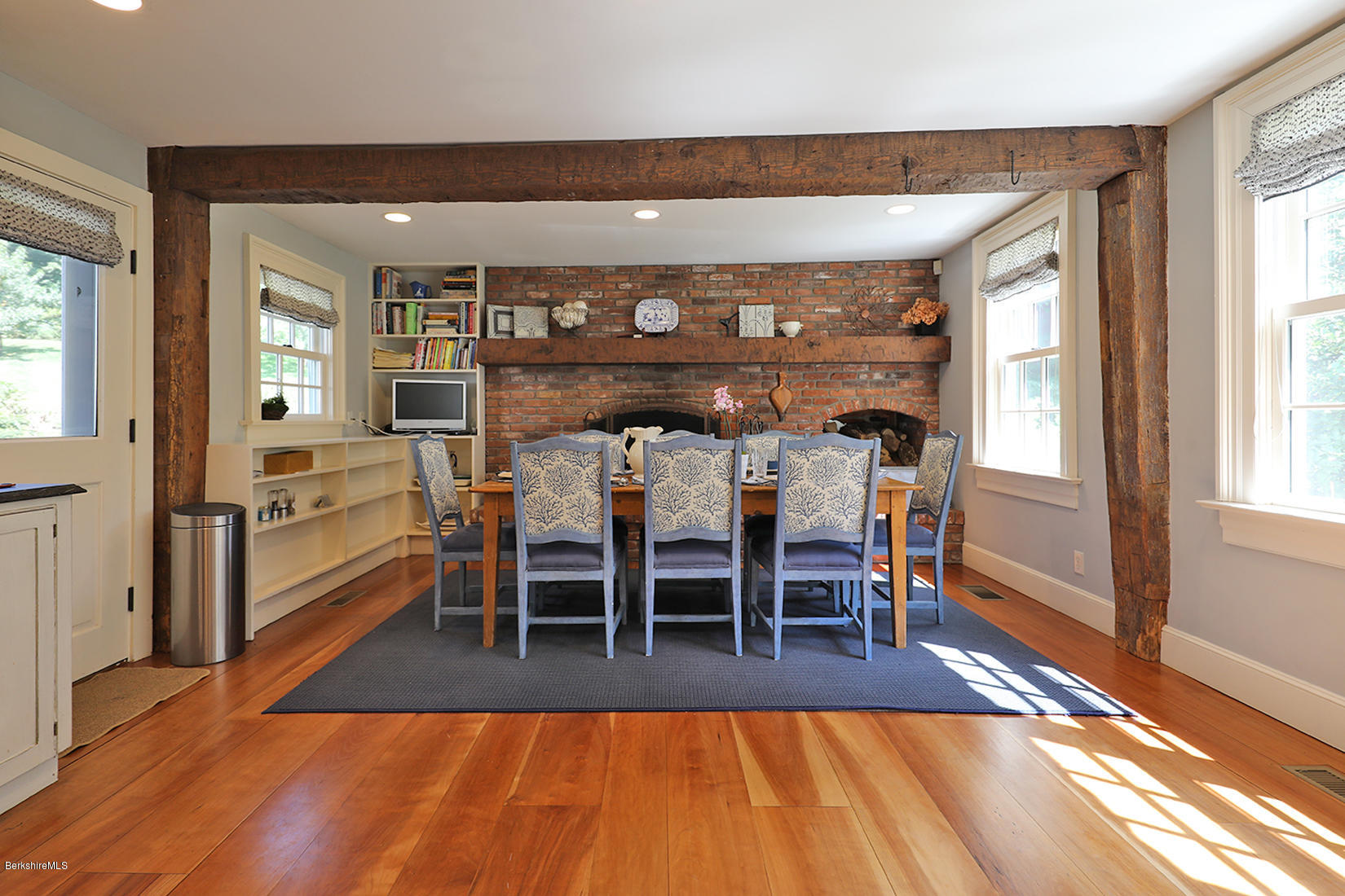 93 Main Road Tyringham, MA 01264 - Photo 14 of 61 a dining room with furniture and wooden floor