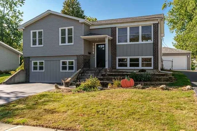 a view of house with outdoor space