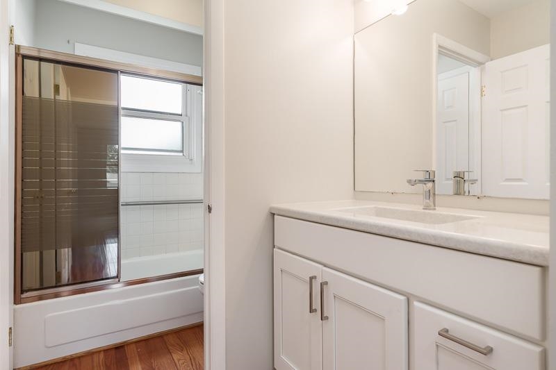 7924 Westview Lane Woodridge, IL 60517 - Photo 23 of 40 a bathroom with a sink and a mirror