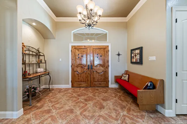 a living room with furniture fireplace and flat screen tv
