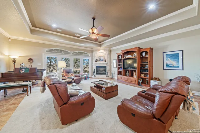a kitchen with stainless steel appliances granite countertop a sink dishwasher and cabinets with wooden floor