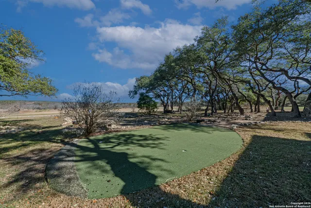an aerial view of house with yard