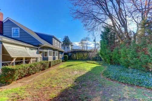a view of a big yard next to a house