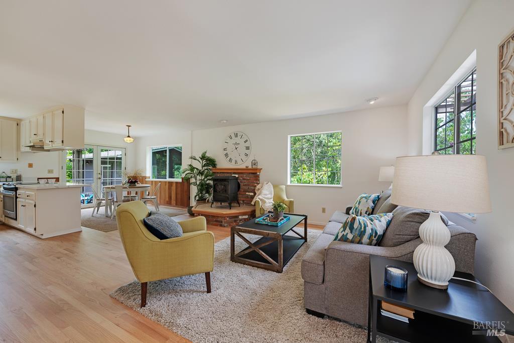 4542 Thomas Road Sebastopol, CA 95472 - Photo 11 of 60 a living room with furniture and a wooden floor