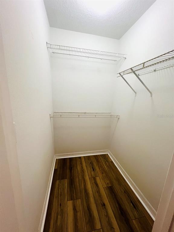 15 Bunker Knolls Lane, Unit B Palm Coast, FL 32137 - Photo 7 of 11 a view of a room with racks on the wall