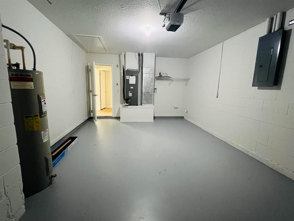 15 Bunker Knolls Lane, Unit B Palm Coast, FL 32137 - Photo 10 of 11 an empty room with windows