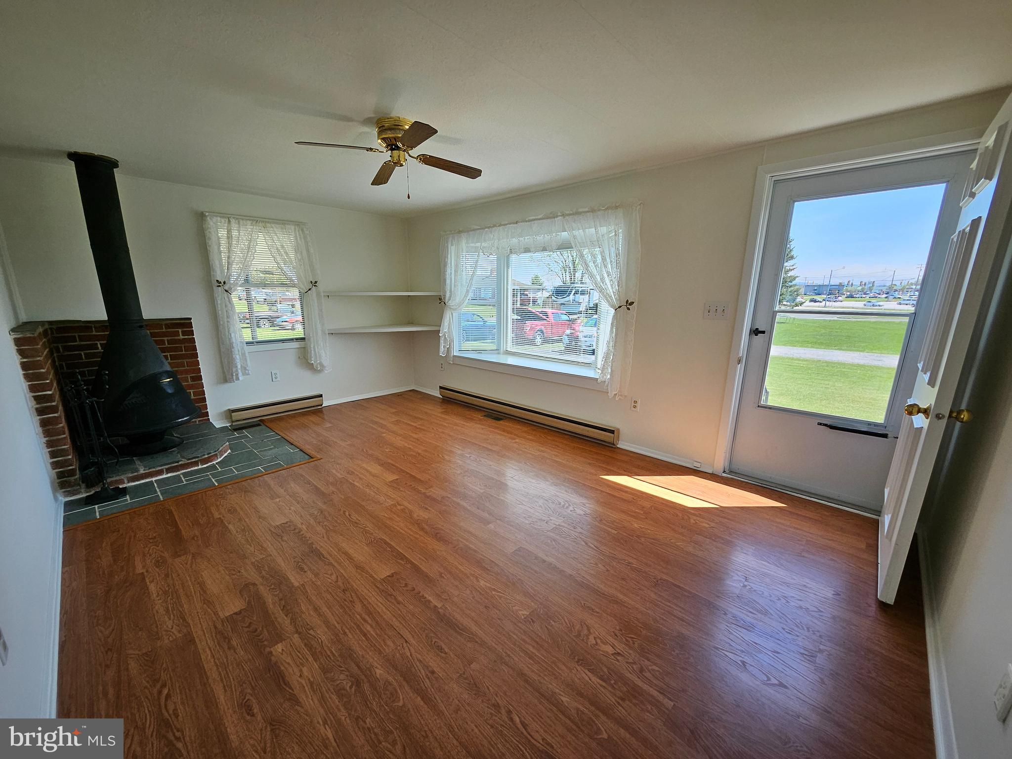 254 Jefferson Terrace Road Charles Town, WV 25414 - Photo 13 of 44 Comforting Living Room & Main Front Door