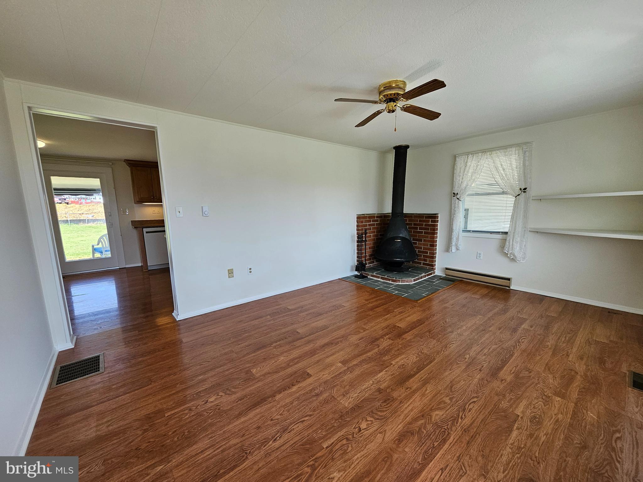 254 Jefferson Terrace Road Charles Town, WV 25414 - Photo 14 of 44 Sunlit Living Room