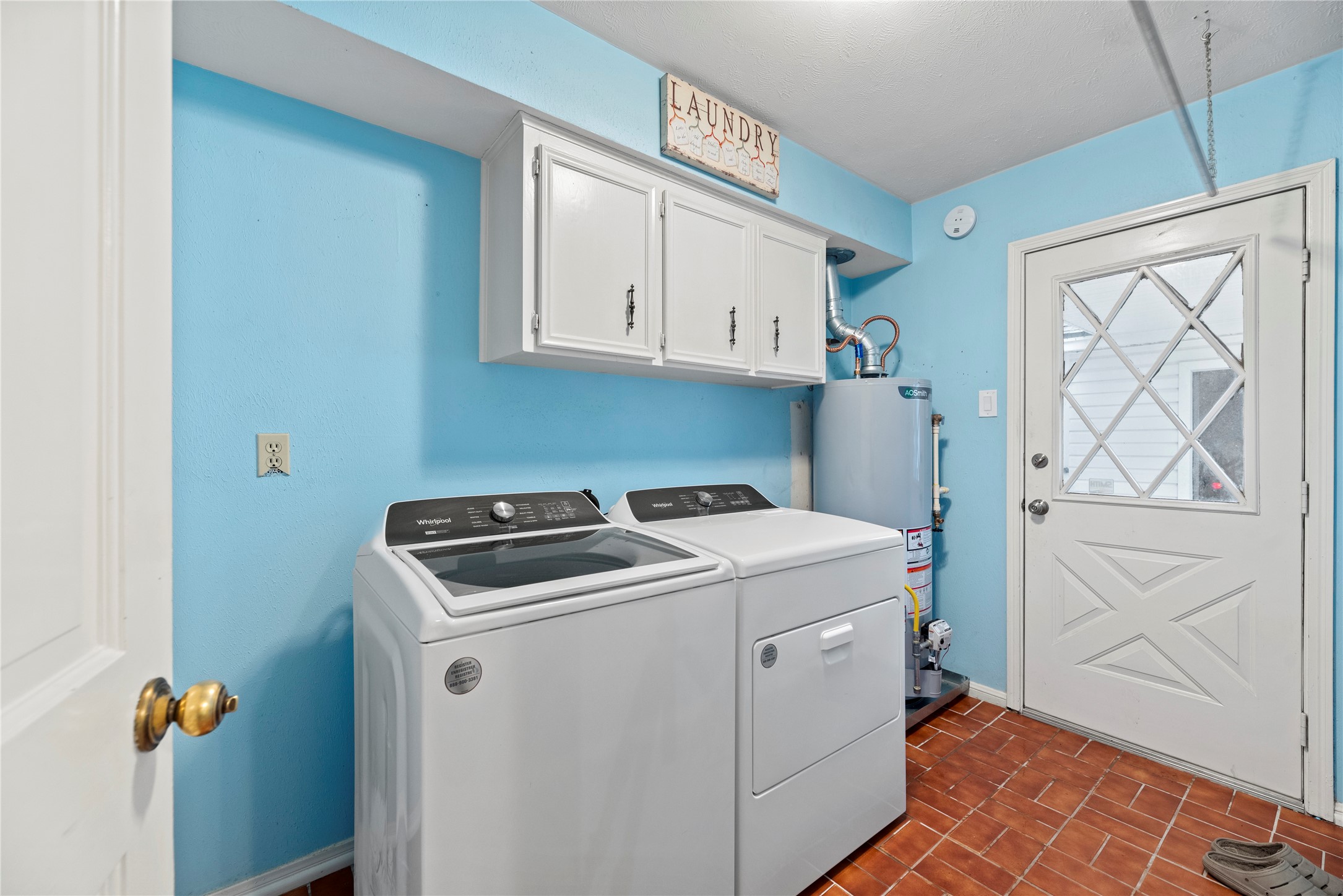 17814 Theiss Mail Rte Road Spring, TX 77379 - Photo 16 of 24 a utility room with dryer and washer