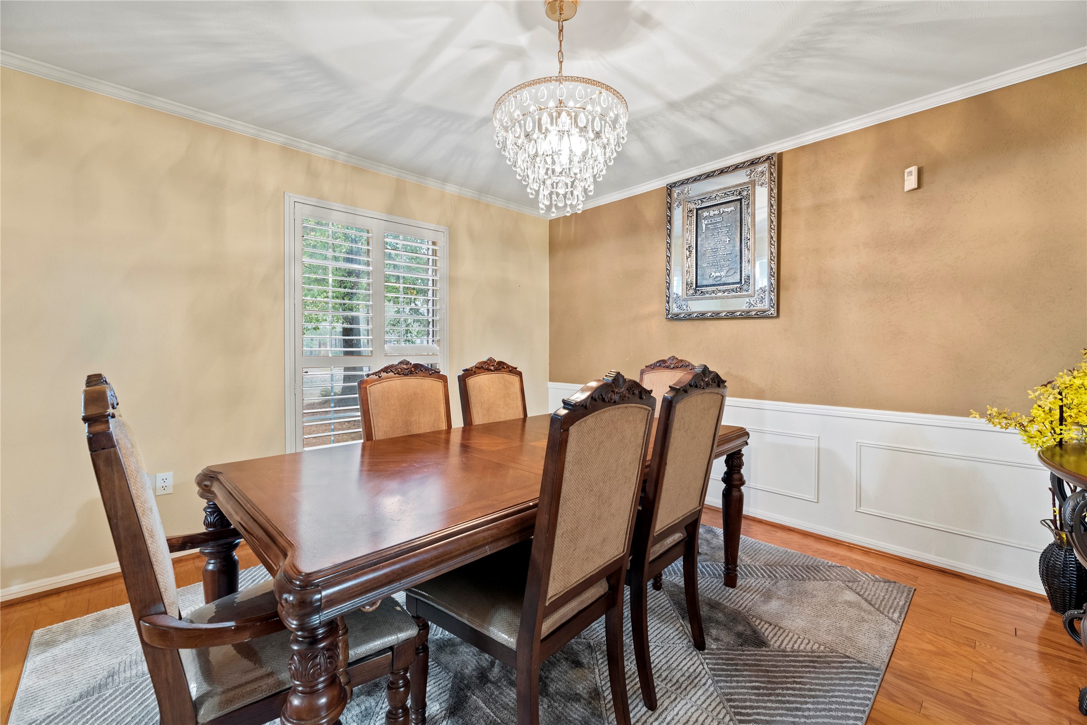 17814 Theiss Mail Rte Road Spring, TX 77379 - Photo 24 of 24 a view of a dining room with furniture and wooden floor