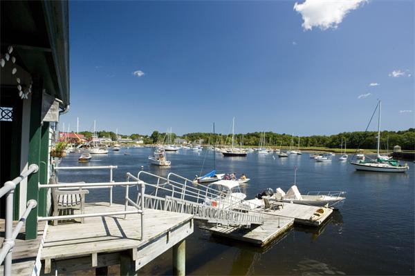 7 Norton's Point Road Manchester, MA 01944 - Photo 22 of 29 a view of a lake with couches and wooden floor