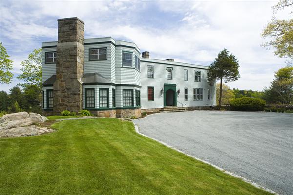 7 Norton's Point Road Manchester, MA 01944 - Photo 28 of 29 a front view of a house with a yard