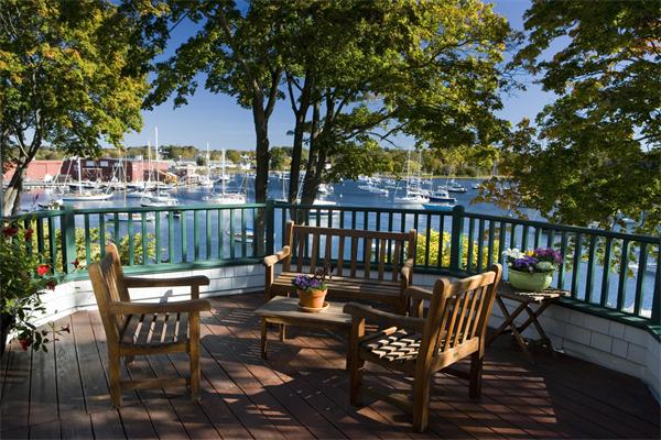 7 Norton's Point Road Manchester, MA 01944 - Photo 3 of 29 a view of a chairs and table on the deck