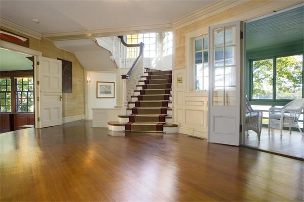 7 Norton's Point Road Manchester, MA 01944 - Photo 4 of 29 a view of empty room with wooden floor and floor to ceiling window