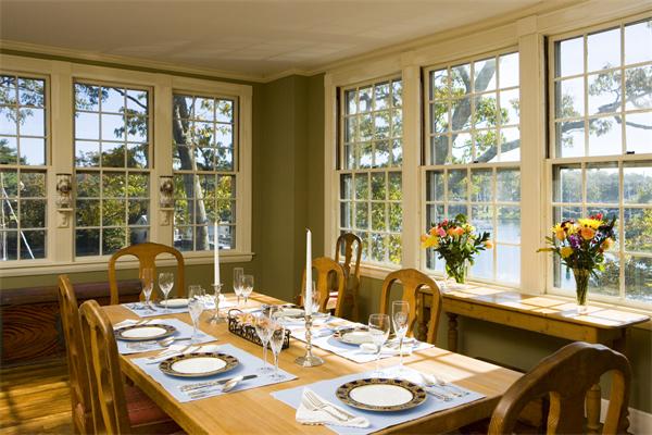 7 Norton's Point Road Manchester, MA 01944 - Photo 6 of 29 a dining room with furniture a large window and a dining table