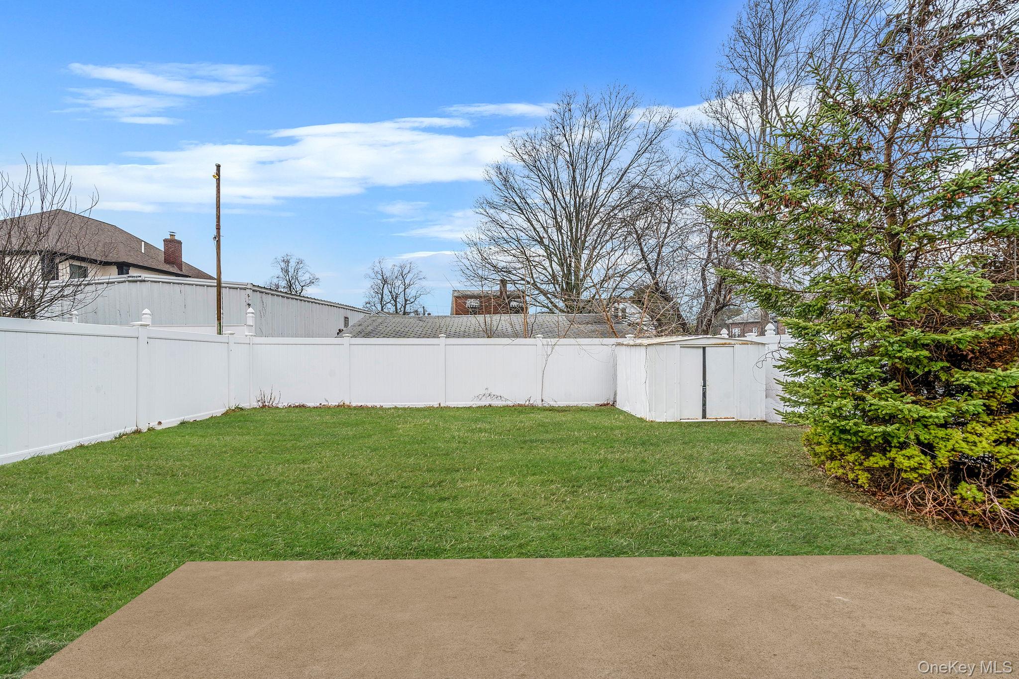 12 Edna Court Valley Stream, NY 11580 - Photo 20 of 20 a view of yard with tree s