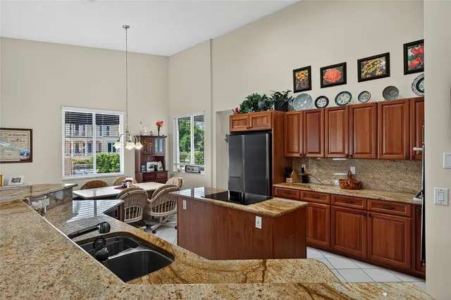 a living room with furniture fireplace and flat screen tv