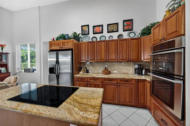 a bathroom with a glass shower door and a mirror