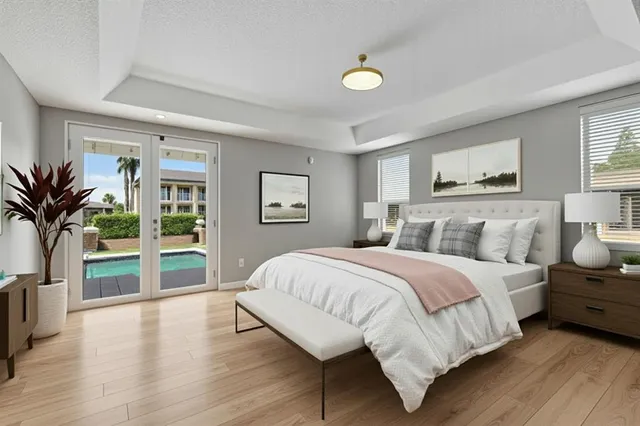 a bedroom with a bed and dresser