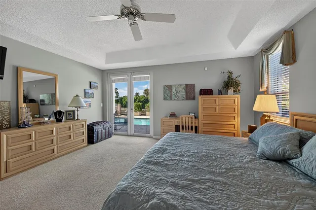 a balcony with wooden floor and city view
