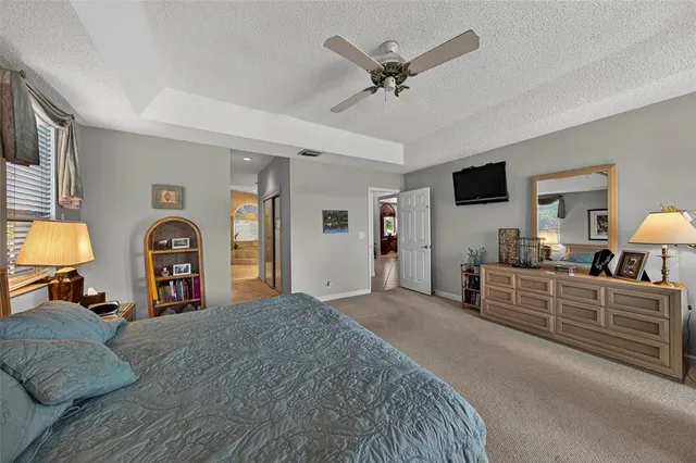 a view of a chairs and table in the balcony