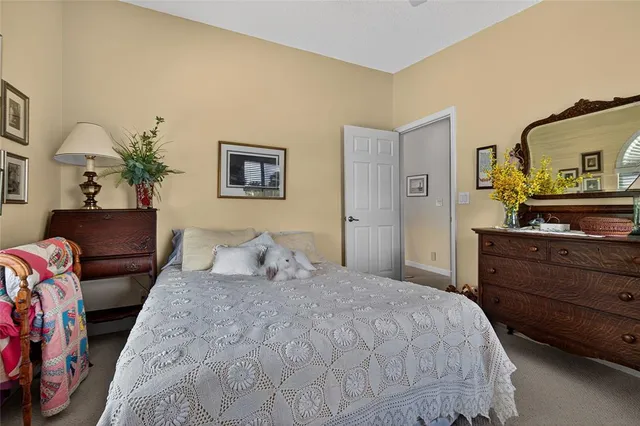 an aerial view of a house with a lake view