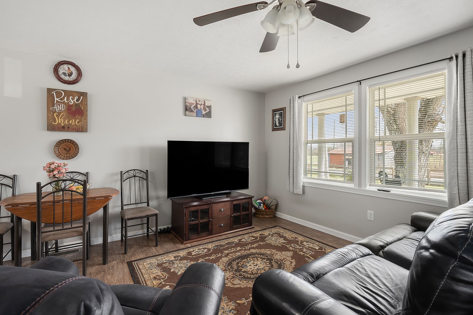 9025 Austin Bottom Road Baxter, TN 38544 - Photo 5 of 35 a living room with furniture and a flat screen tv