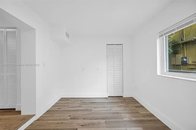 a bathroom with a sink toilet and vanity
