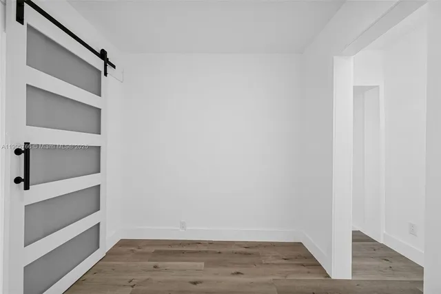 an aerial view of residential houses with city view