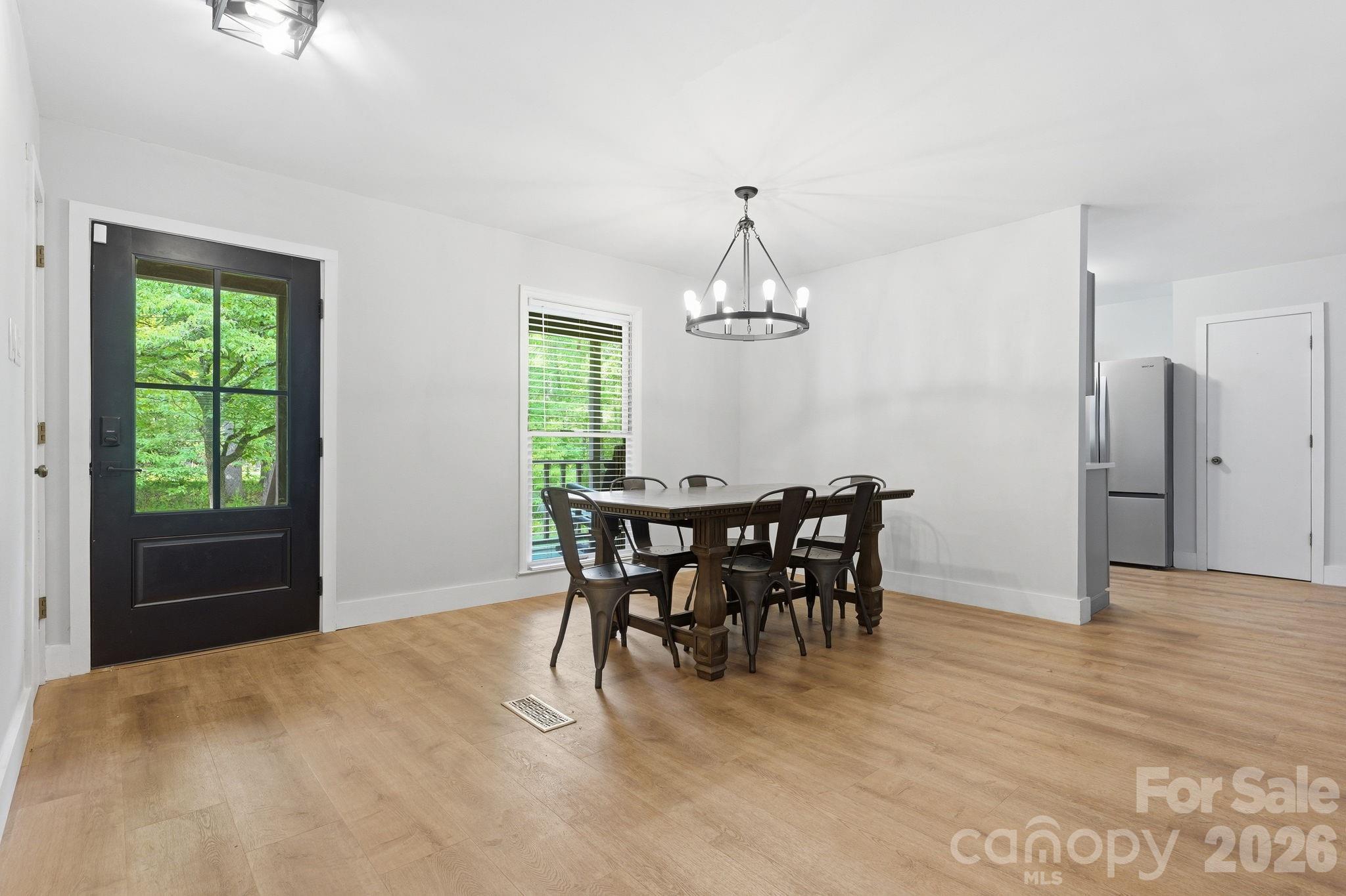 5347 Haney Road York, SC 29745 - Photo 9 of 39 a view of a dining room with furniture window and wooden floor