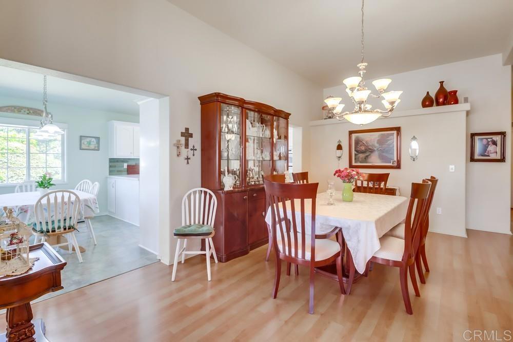 9500 Harritt Road, Unit 213 Lakeside, CA 92040 - Photo 15 of 25 a view of a dining room with furniture window and wooden floor