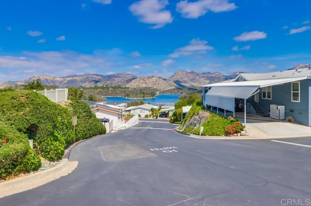 9500 Harritt Road, Unit 213 Lakeside, CA 92040 - Photo 25 of 25 a view of a house with a yard and potted plants