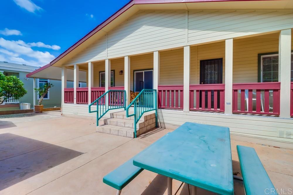 9500 Harritt Road, Unit 213 Lakeside, CA 92040 - Photo 6 of 25 a view of a house with a patio