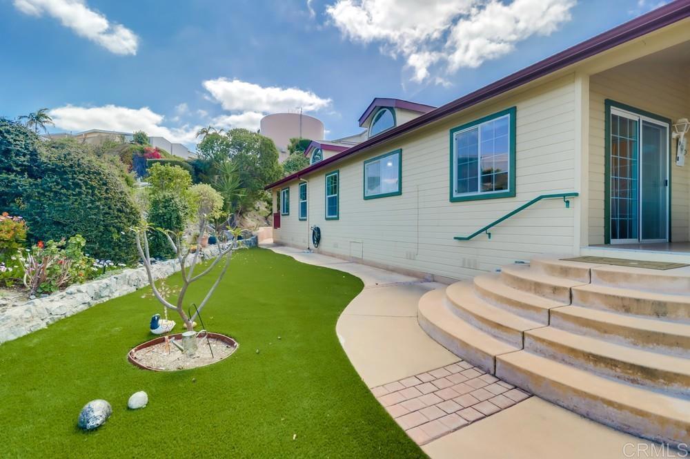 9500 Harritt Road, Unit 213 Lakeside, CA 92040 - Photo 10 of 25 a view of a house with a backyard and porch