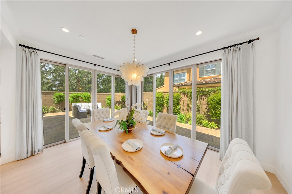 182 Frontier Irvine, CA 92620 - Photo 3 of 7 a view of a dining room furniture window and outside view