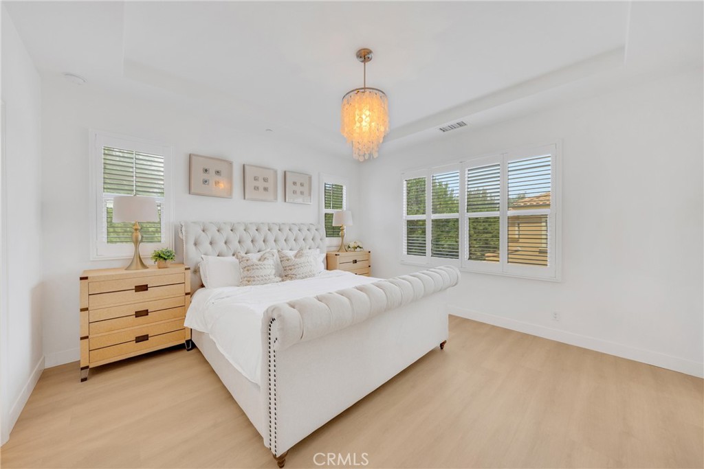 182 Frontier Irvine, CA 92620 - Photo 4 of 7 a bedroom with bed and a window