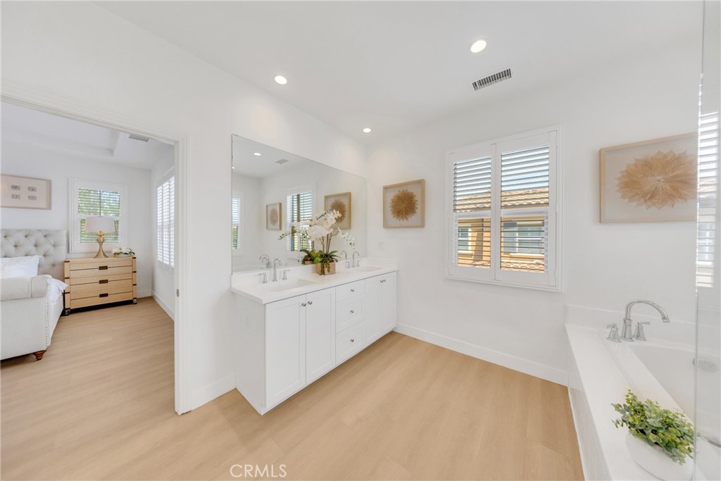 182 Frontier Irvine, CA 92620 - Photo 5 of 7 a view of a bedroom with furniture and windows