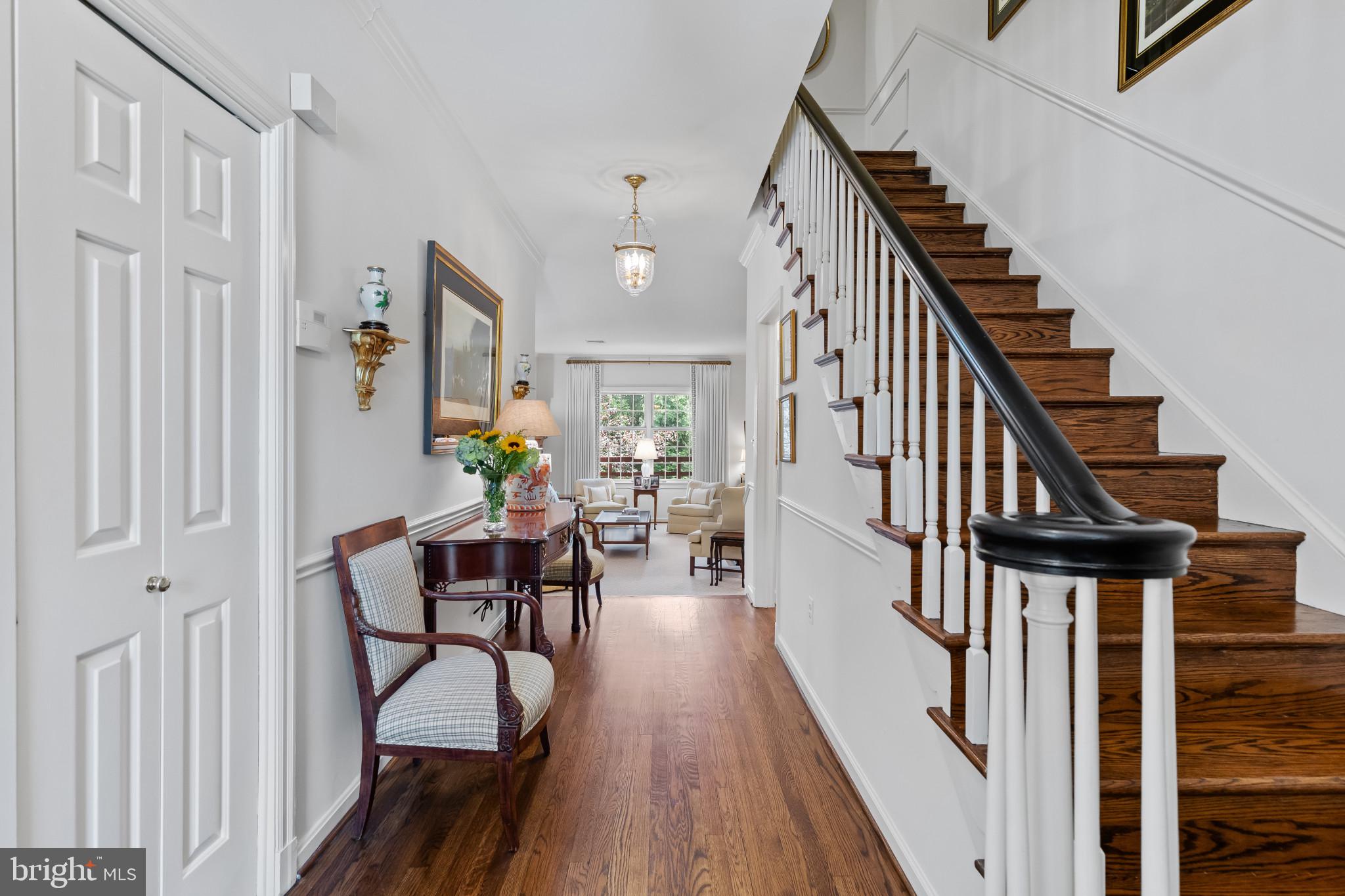 8027 Strauff Road, Unit 6 Towson, MD 21204 - Photo 2 of 39 a view of entryway and hall with wooden floor